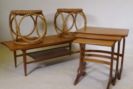 A nest of three G-Plan Alfresco occasional tables, a mid century teak two tier coffee table an a