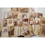 A quantity of Victorian portrait photographs and cartes de visites, 4" x 2½"