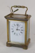 A French brass cased time peice carriage clock, with new platform escapement, white enamel dial