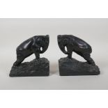 A pair of filled and bronzed copper elephant bookends, 6" long, 6" high