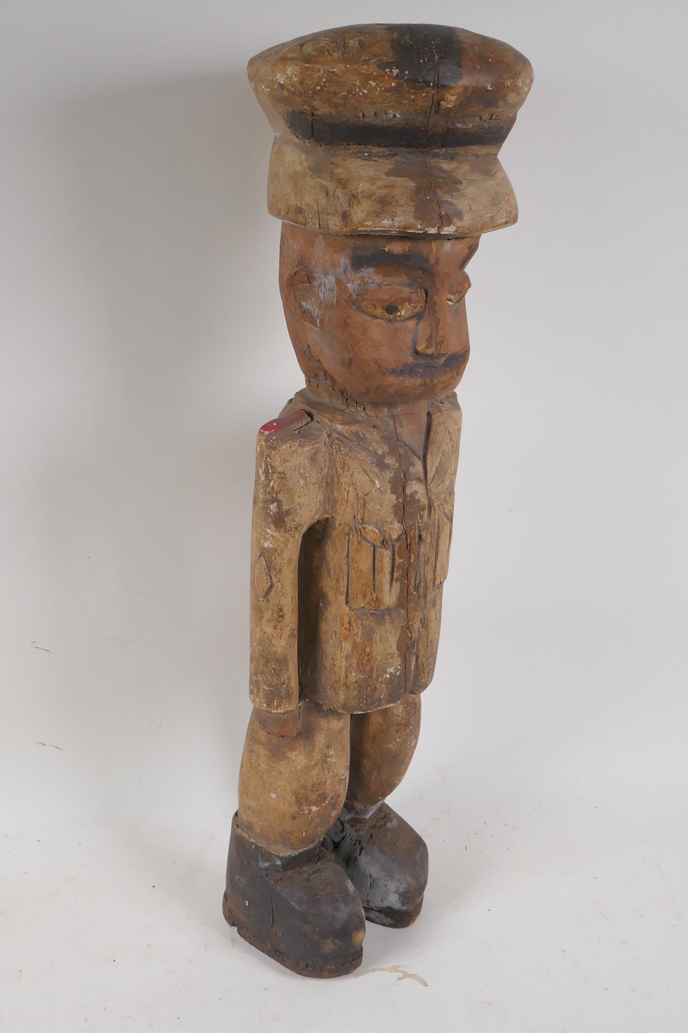 A carved wood figure of a soldier, 20" high - Image 2 of 3