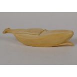 A Japanese Meiji period okimono carved as a banana, 5½" long