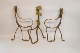 A set of C19th wrought iron bench ends and centre support, 37" high