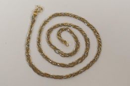 An 18ct white and yellow gold multi strand necklace, 11.3g, 18" long