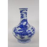 A blue and white porcelain vase decorated with dragons, Chinese Qianlong seal mark to base, 12½"