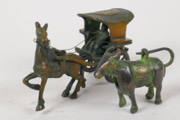 An Indian bronze figure of a man driving a horse drawn carriage, 6" long, and a small bronze