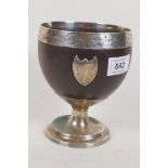 A Georgian coconut cup, with white metal mounts, the base with maker's mark, possibly William