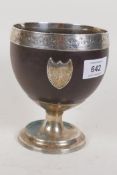 A Georgian coconut cup, with white metal mounts, the base with maker's mark, possibly William