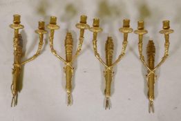 Two pairs of ormolu two branch wall sconces in the form of arrow quivers, 8" x 15½"