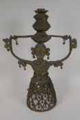 An Indian bronze figural lamp base, cast as a female figure supporting a lamp holder, 16" high