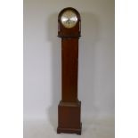 A mahogany cased dome top grandmother clock with Westminster chimes movement, for restoration, 58"