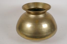A heavy spun bronze spittoon, 9" high, 11" diameter