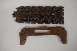 A Black Forest carved wood letter rack, 14½" long, and a carved wood bag handle