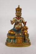 A painted and gilt bronze Nepalese Buddha, 10" high