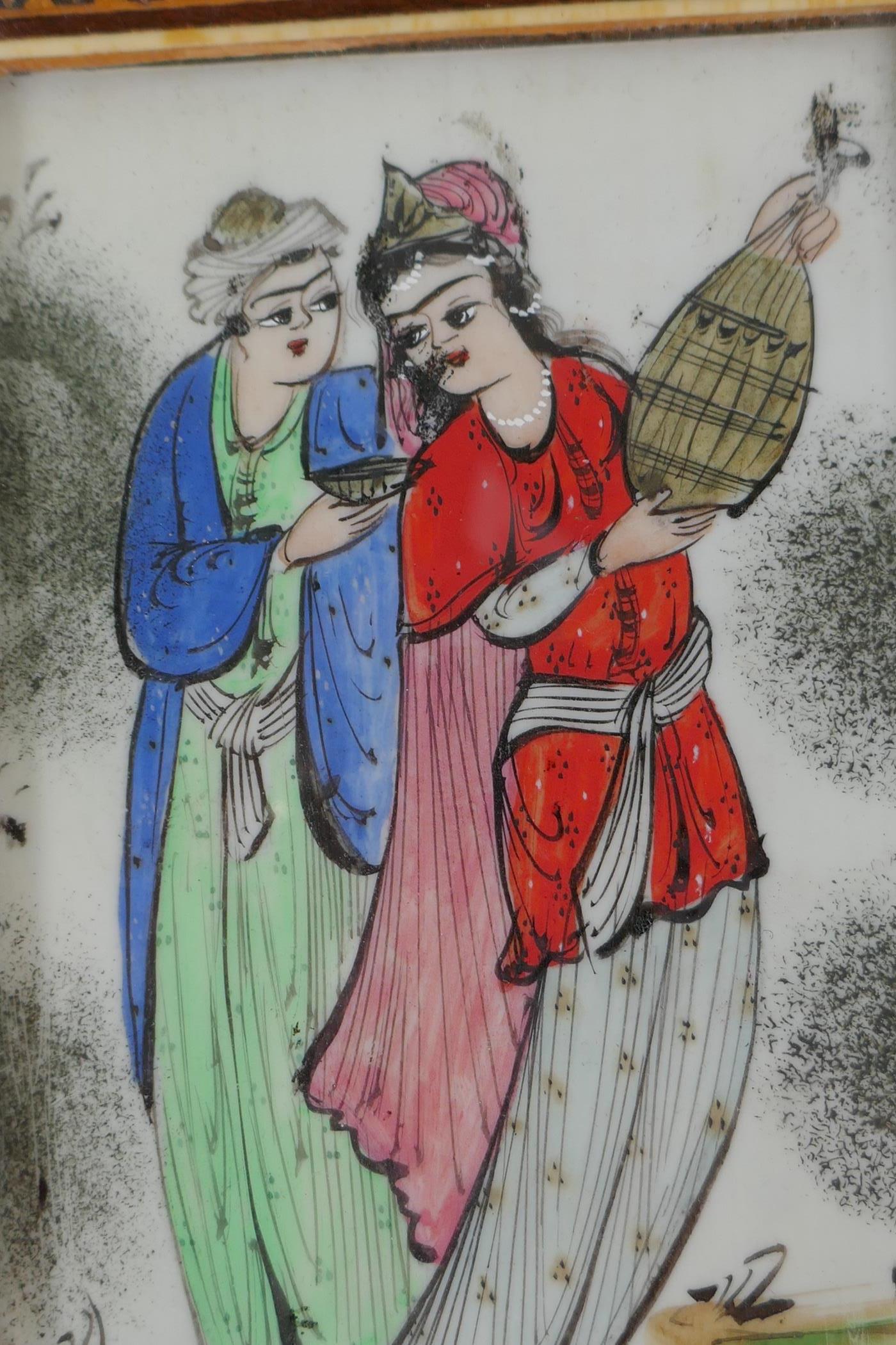 A Persian painting in a micro mosaic frame of a courting couple, 7" x 5½" overall - Image 2 of 3