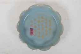 A Chinese Ru ware style porcelain dish with frilled rim, the bowl with engraved and gilt character