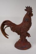 A cast iron garden figure of a cockerel, 16" high