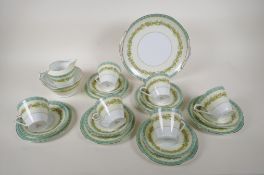 A Noritake floral pattern porcelain tea set, six place settings with bread and butter plate, milk