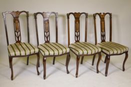 A set of four late Victorian high back parlour chairs on cabriole legs, the backs profusely inlaid