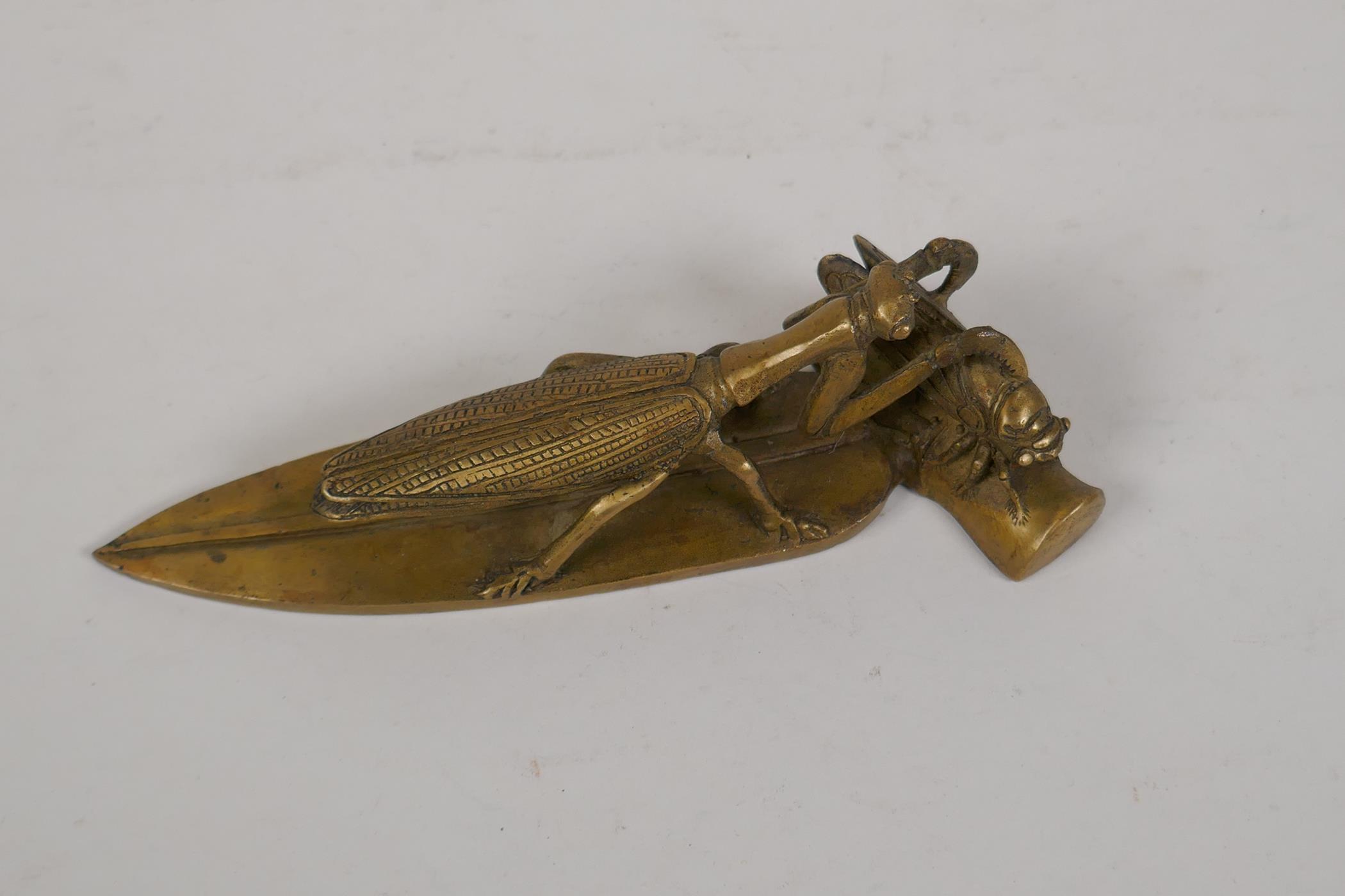 A Chinese bronze scroll weight in the form of a mantis preying on a cicada, 7½" long - Image 2 of 3