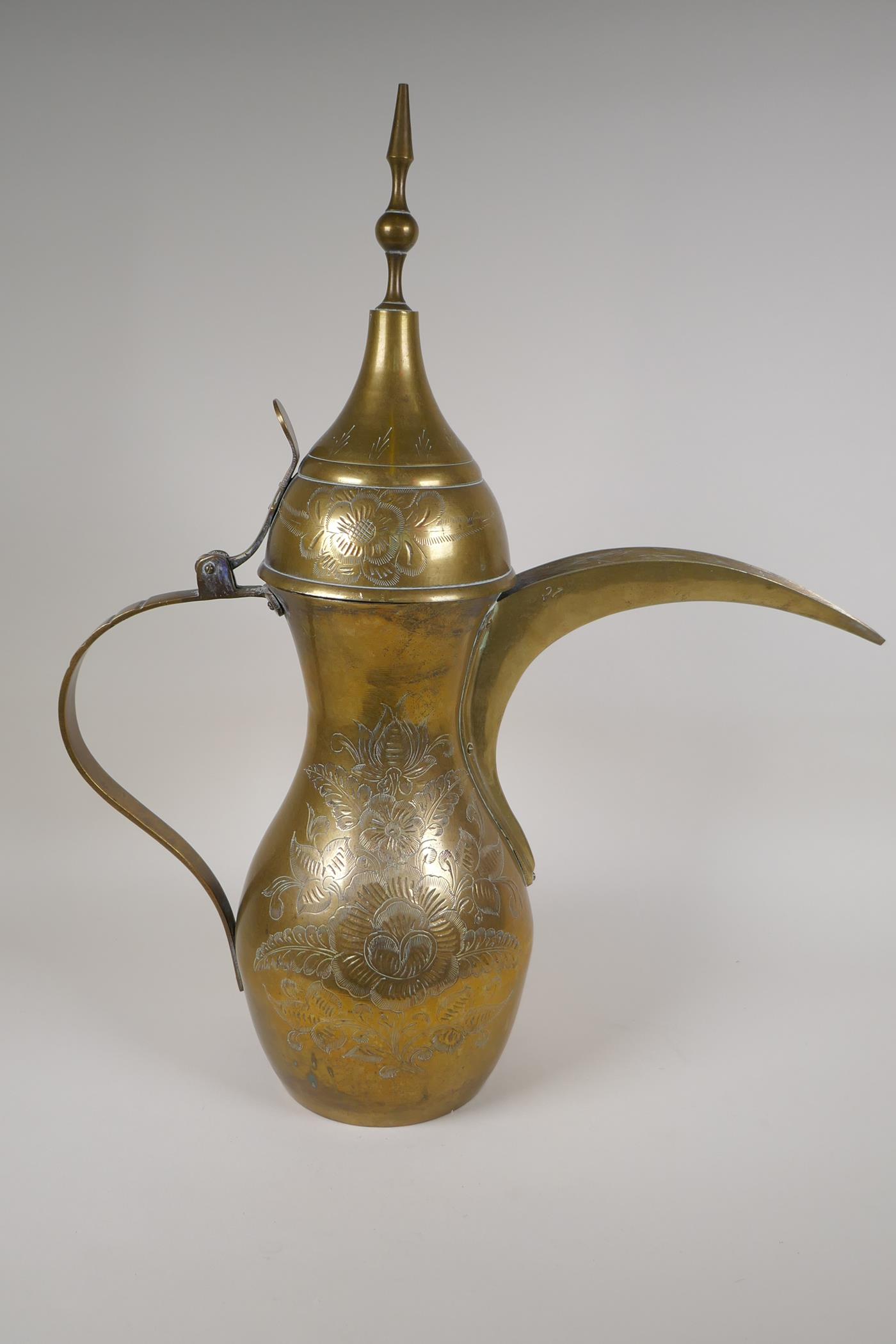 A Turkish brass coffee pot with chased floral decoration, 23½" high - Image 5 of 8