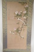 A Chinese printed watercolour scroll depicting asiatic birds amongst flowers, 12" x 27"