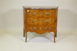 A C19th French serpentine front tulipwood commode, with rouge marble top, ormolu mounts and three