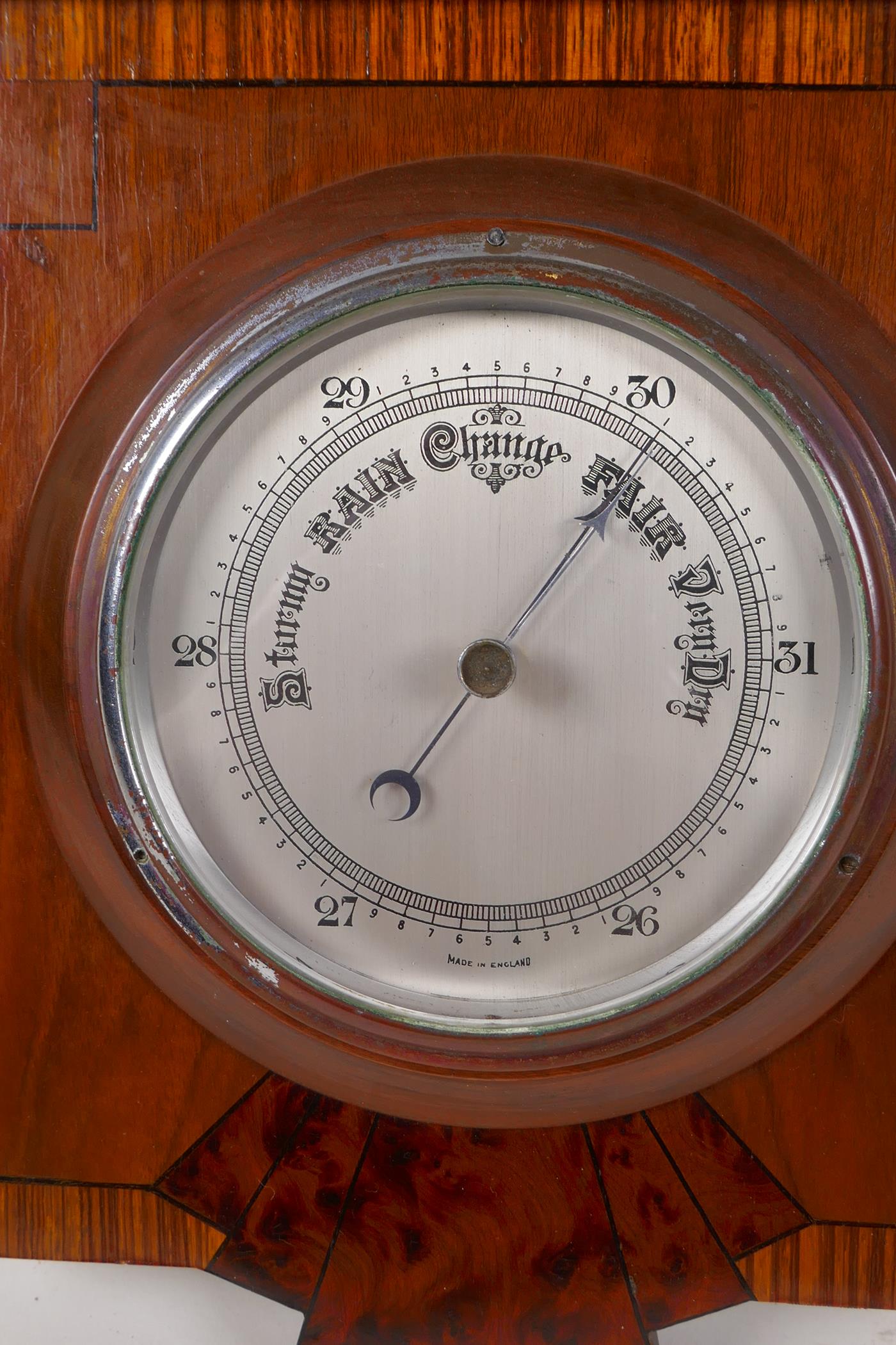 An aneroid barometer in an Art Deco specimen wood case, 11½" x 9" - Image 2 of 2