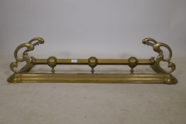 A Victorian brass fire fender, 49" x 16" x 11"