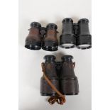 Three pairs of vintage binoculars including Negretti and Zambra binoculars