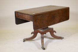 An early C19th mahogany drop leaf Pembroke table with single frieze drawer, raised on square