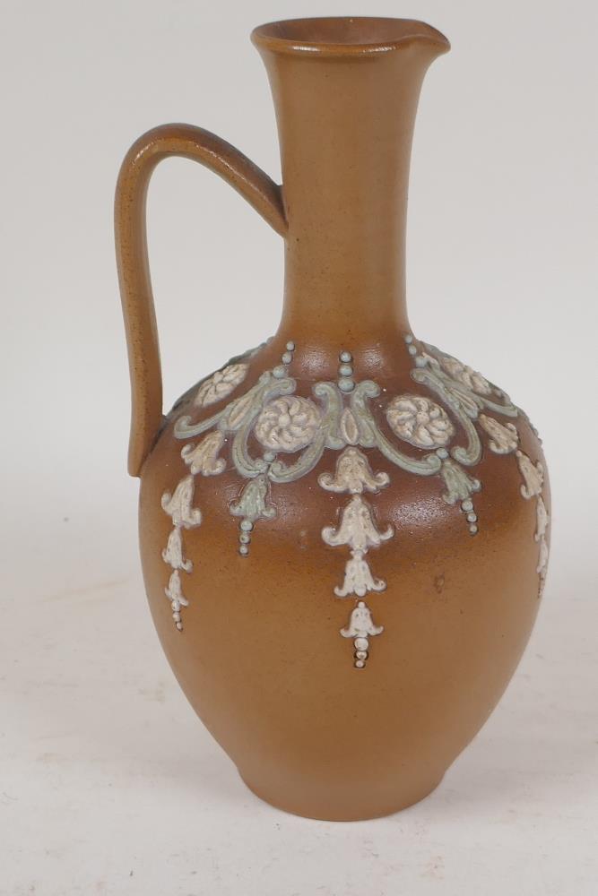 A Doulton stoneware jug of classical form with applied garland decoration - Image 3 of 3