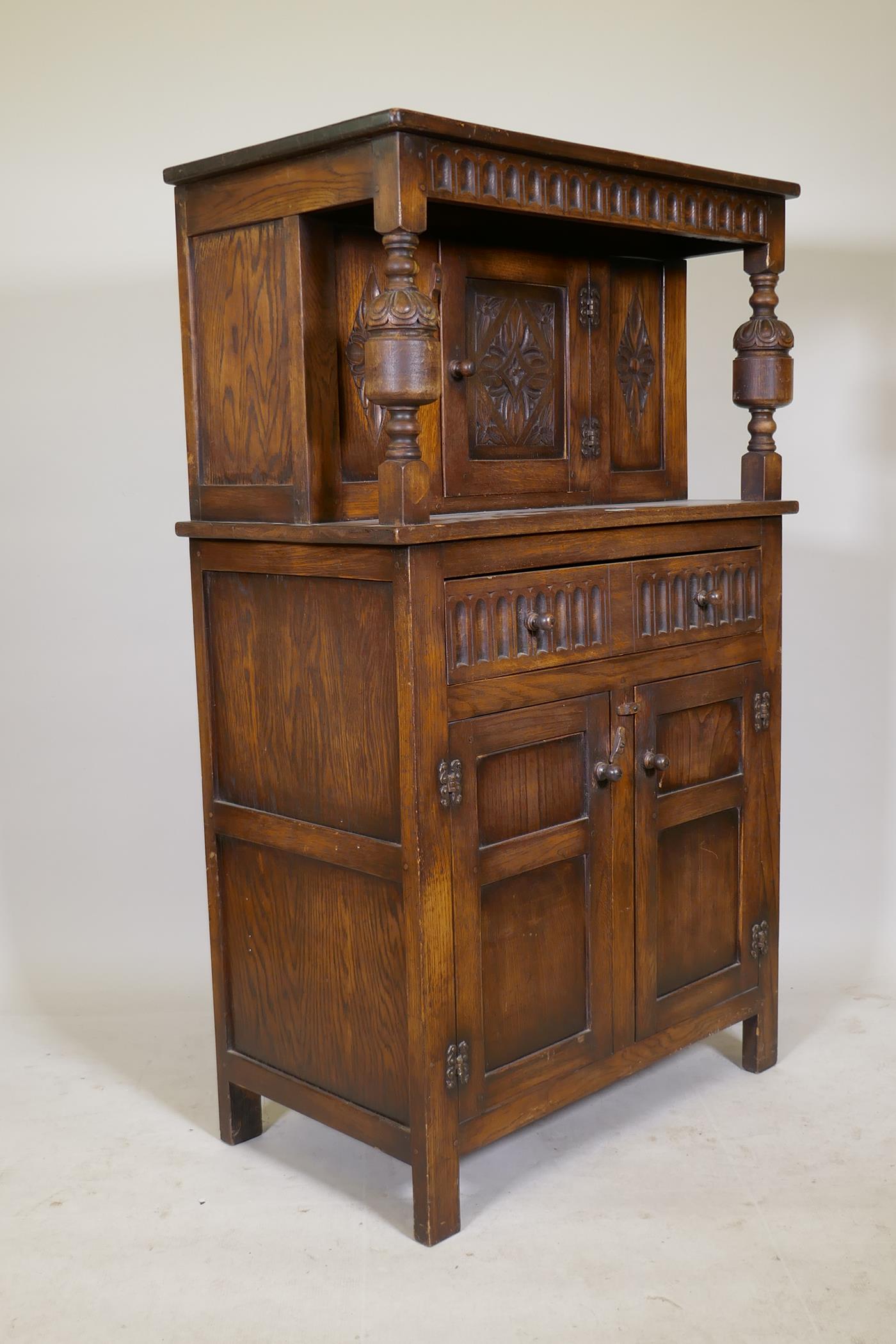 A small Reprodux of Brighton oak court cupboard, with carved frieze and decoration, single drawer - Image 2 of 2