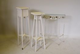 A vintage metal and glass top demi lune table, 25" x 10" x 29" and two painted jardiniere stands
