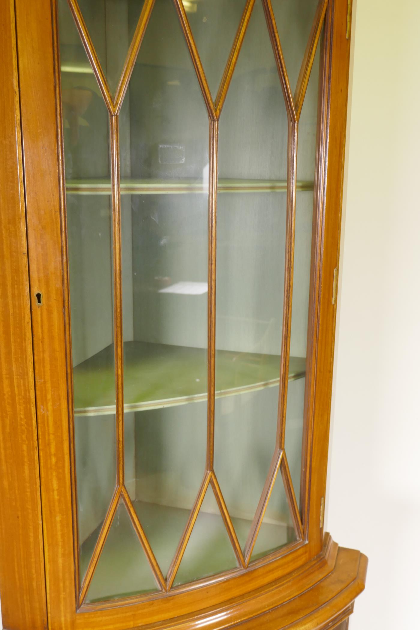 A satinwood bow fronted standing corner display cabinet, with astragal glazed door over a cupboard - Image 4 of 4