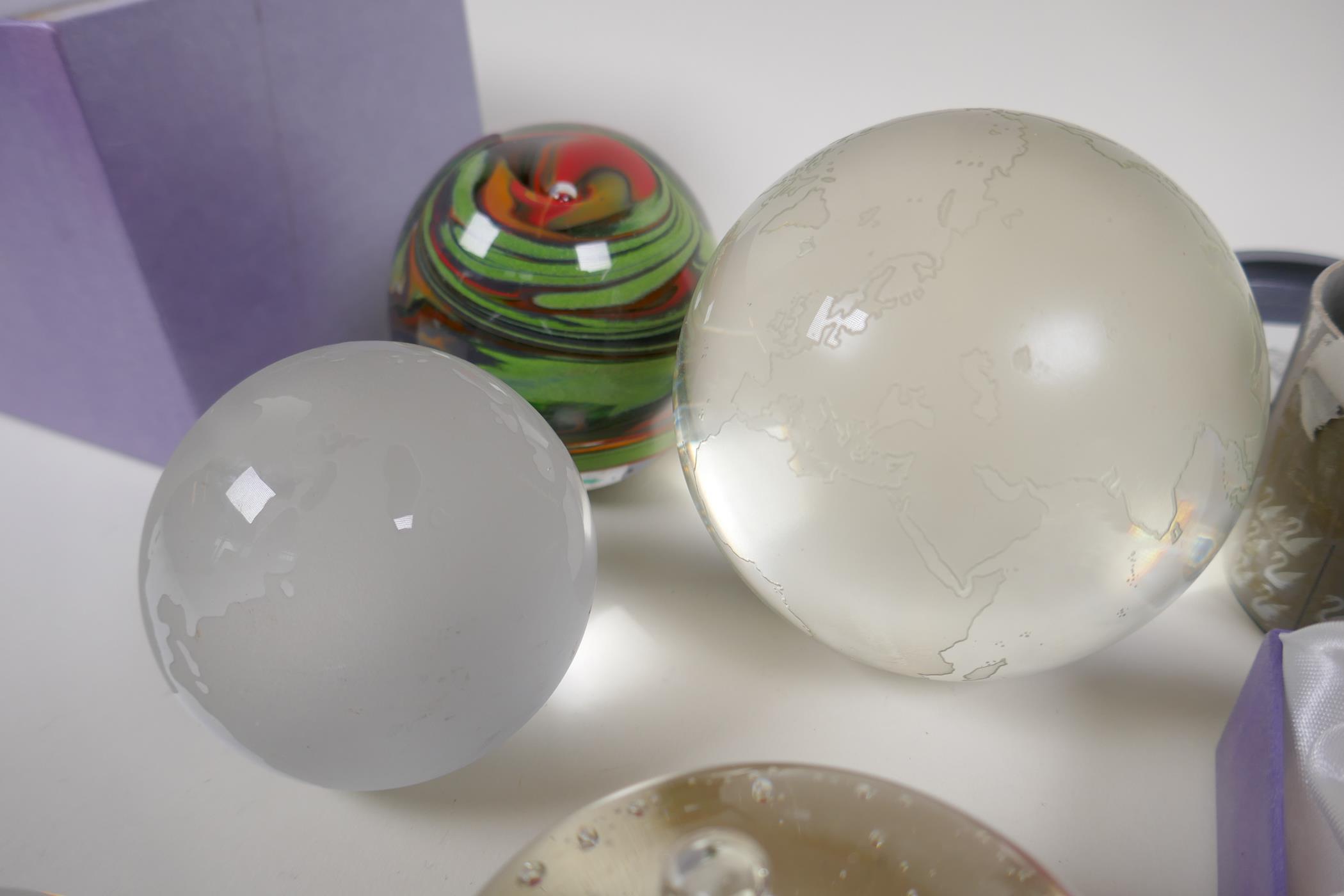 Four glass paperweights, two etched, glass world globes and two Swarovski faceted crystal weights - Image 3 of 4