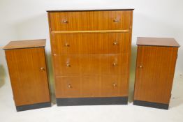 A mid century teak veneered chest of four long drawers and a matching pair of bedside cupboards, 31"