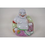 A Chinese porcelain figure of a laughing Buddha, 12" high