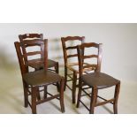 A set of four bar back Cypriot stools