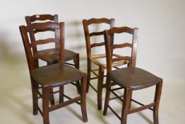 A set of four bar back Cypriot stools