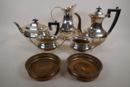 A silver plated four piece tea set, a Viners silver plated lemonade jug and a pair of C19th wine