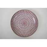 A red and white porcelain dish with all over longevity symbol decoration, Chinese KangXi mark to