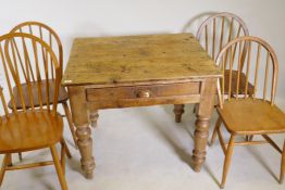 A pine scullery table with single frieze drawer on turned supports, 34" x 29", 30" high, and four