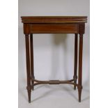 A C19th French mahogany card table triple fold out top, raised on fluted supports, 22" x 14" x 31"