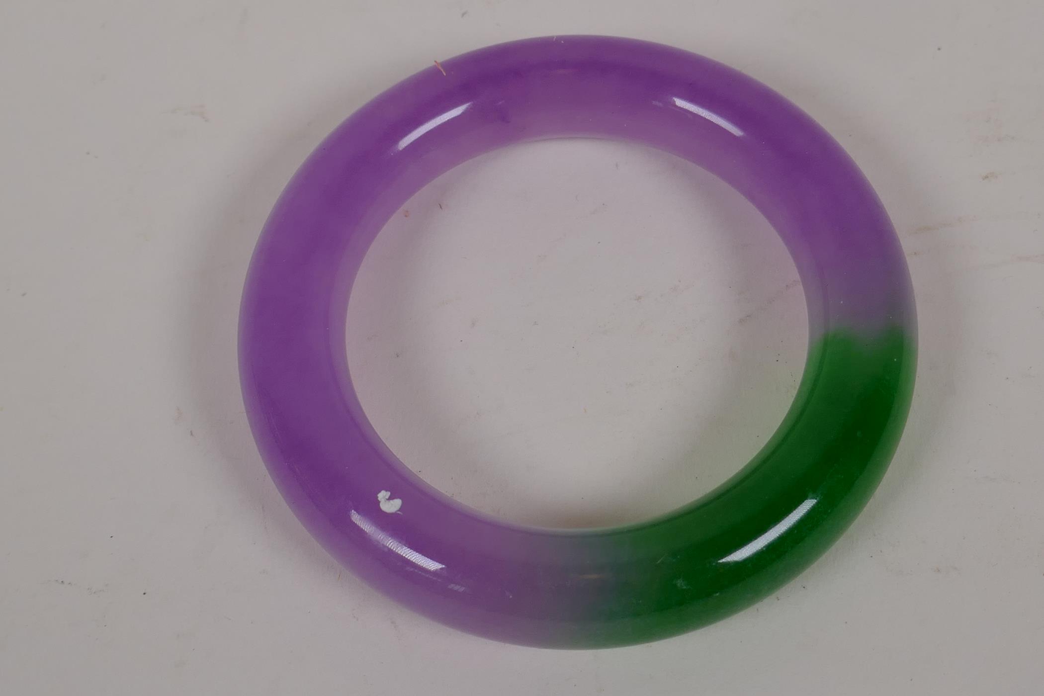 A Chinese lavender and green jade bangle, 3" diameter - Image 2 of 2
