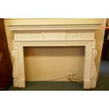 Architectural salvage, a large painted pine fire surround, with carved decoration, late C19th/