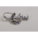 A 925 silver horse shoe and crop brooch, 1½" long