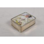 A sterling silver pill box set with a cold enamel plaque depicting a vintage female tennis player,