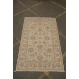 A cream ground wool Zeigler carpet, 67" x 100"