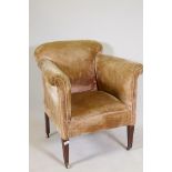 Victorian armchair, raised on square tapering supports with brass castors